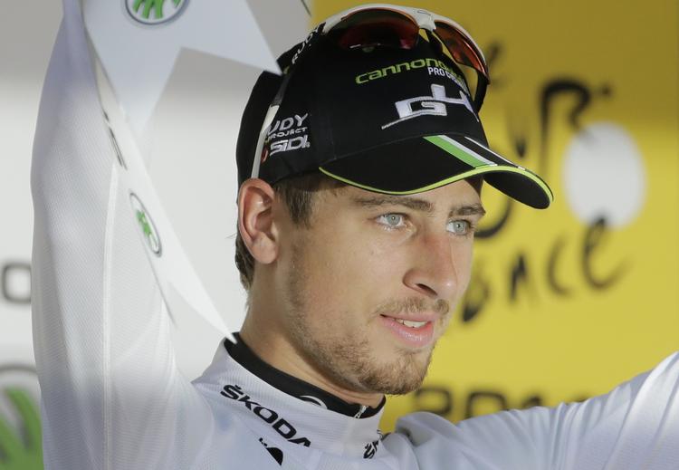 Sammenbrud. Sagen – her på podiet under sidste års Tour de France, hvor han kørte for Cannondale-holdet – kunne ikke være med, da det italienske løb skulle afgøres. 