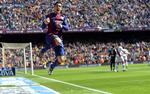 6-1. Luis Suarez scorede to og skabte plads til en af Lionel Messis tre scoringer mod Rayo. 