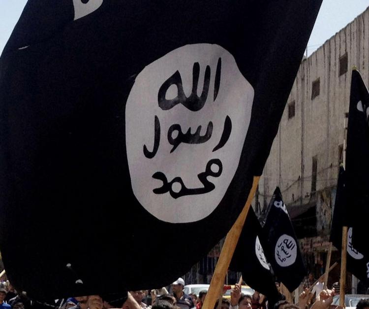 IS. De blafrende sorte faner er blevet Islamisk Stats særlige kendetegn. 