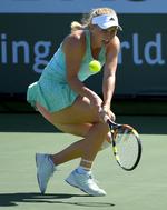 Exit. Caroline Wozniacki taber til Belinda Bencic ved turneringen Indian Wells i USA. 