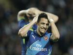 UHA. Arsenals Alexis Sanchez ærgrer sig vildt over en misbrugt mulighed, og dem var der mange af mod Monaco, der denne gang havde sært ved at matche holdet fra London. 