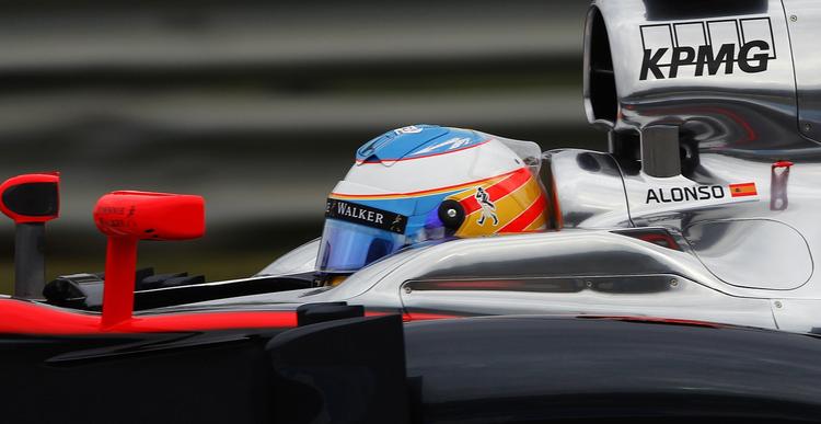 hjernerystelse. Fernando Alonso håber at være tilbage i sin McLaren-racer i weekenden. 