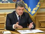 Afsat. Ukraines præsident Petro Porosjenko afsætter den magtfuld guvernør og oligark Igor Kolomojskij. 
