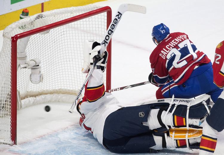 Mål. Lars Eller sætter pucken ind bag Florida Panthersl målmand Roberto Luongo. 