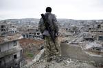 Murbrokker. Store dele af byen Kobane i det nordlige Syrien er efterladt i ruiner efter flere måneders kampe mellem kurdiske militser og Islamisk Stat. Amerikanske bombeangreb mod IS bidrog også til ødelæggelserne. (arkivfoto) 