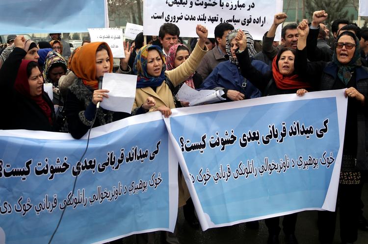 Protester. Demonstranter på gaden i Kabul i protest mod den stigende vold mod kvinder i landet. 