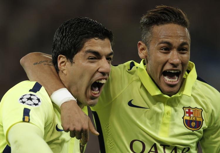 Måååål. Neymar (th) åbnede scoringen, inden Suarez tog over. 