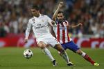 Duel. Real og Atletico spillede i sidste uge CL-kvartfinale og det blev Ronaldo (tv), der trak det længste strå i kampene mod Atletico og Arda Turan. 