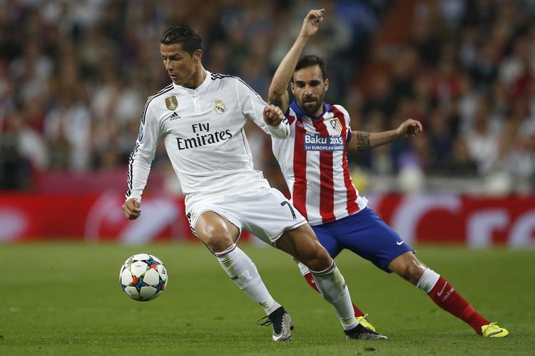Duel. Real og Atletico spillede i sidste uge CL-kvartfinale og det blev Ronaldo (tv), der trak det længste strå i kampene mod Atletico og Arda Turan. 
