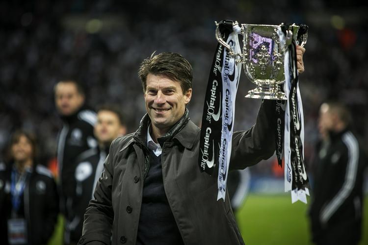 Pokalmester. Michael Laudrups Lekhwiya vandt i aften pokaltitlen i Qatar. Her ses han, da Swansea vandt den lille pokalturnering i England. (Arkivfoto) 