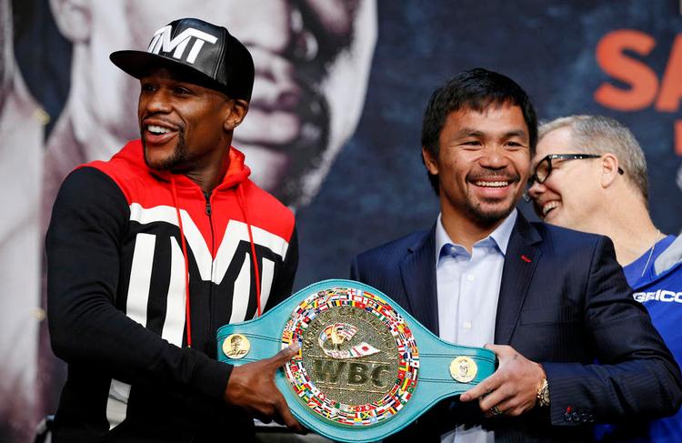 topmøde. Floyd Mayweather (tv.) og Manny Pacquiao kæmper om et specialdesignet VM-bælte i nat. Foto: John Locher/AP 