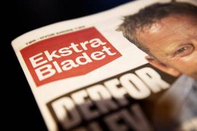 Bøde. Avisen Ekstra Bladet har tjent penge på annoncer for ulovlige spilfirmaer, og det skal ifølge politiet koste JP/Politikens Hus - som Ekstra Bladet hører ind under - millioner. (arkivfoto) 
