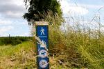 følgesvend. Øhavsstien strækker sig i alt 220 kilometer i Det Sydfynske Øhav og kendes på piktogrammet med den hvide vandringsmand på blå baggrund. 