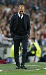 UDFORDRET. Pep Guardiola ønsker at overholde sin aftale med FC Bayern, der gælder for endnu en sæson. Men han vil ikke tale om planer for tiden derefter. 