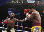 pengemaskine. Floyd Mayweather Jr. (tv) vandt storkampen mod Manny Pacquiao på point efter 12 runder. 