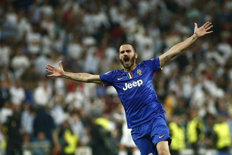 TRIUMF. Leonardo Bonucci skriger sin glæde ud over Santiago Bernabéu, hvor Reals mange forvænte fans i 2. halvleg måtte se deres yndlinge løbe forgæves stormløb mod Buffon i Juve-målet. 