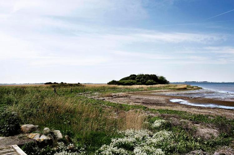 Fredfyldt. Nakskov Fjord en rolig dag, men borgerne skal indstille sig på stormfloder, der går 2,5 meter over det normale. 