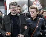 Slut. Den franske tegner Luz (venstre) tegnede forsiden til Charlie Hebdo-nummeret efter angrebet. 