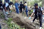 Massegrave. I den sidste måned er der blevet fundet massegrave i den thailandske og malaysiske jungle. Her ses en grav i Thailand. 