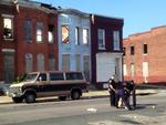 Vold. Baltimore oplever med 38 myrdede sin mest dødelig måned i årevis. På billedet efterforsker politi et skyderi i byen. 