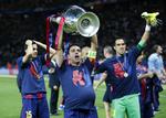 3-1. Barcelona-spillere fejrer finalesejren over Juventus lørdag. 