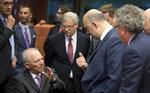 Euroen. Den tyske finansminister  Wolfgang Schaeuble taler med EU's økonomikommissær Pierre Moscovici under et møde mellem eurogruppens finansministre i Bruxelles i dag. 