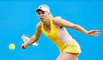 PROBLEMER. Caroline Wozniackis ryg volder kvaler inden hun efter planen træder ind i Wimbledontirsdag. 