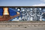 Graffiti. Vægmaleriet 'Evolution' i Sydhavn er lavet af Ulrik Schiødt. 
