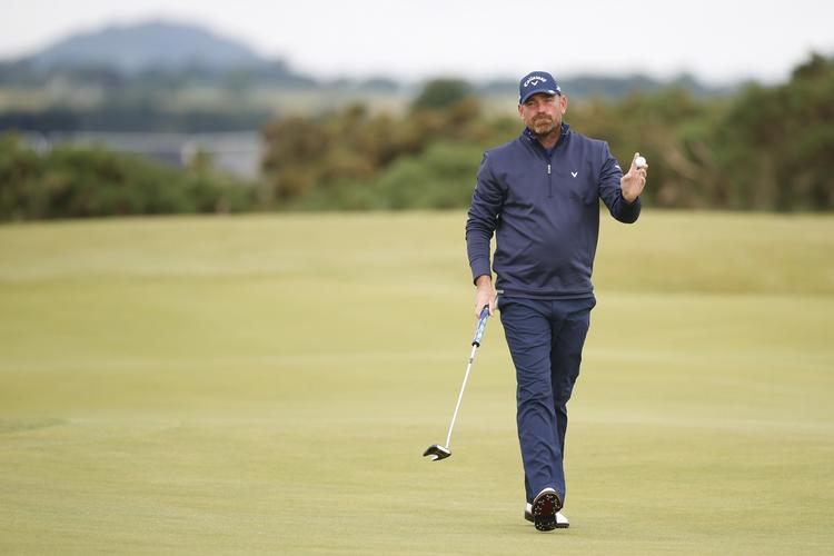 Igang. Danske Thomas Bjørn fik en god start på de legendariske baner i St. Andrews. 