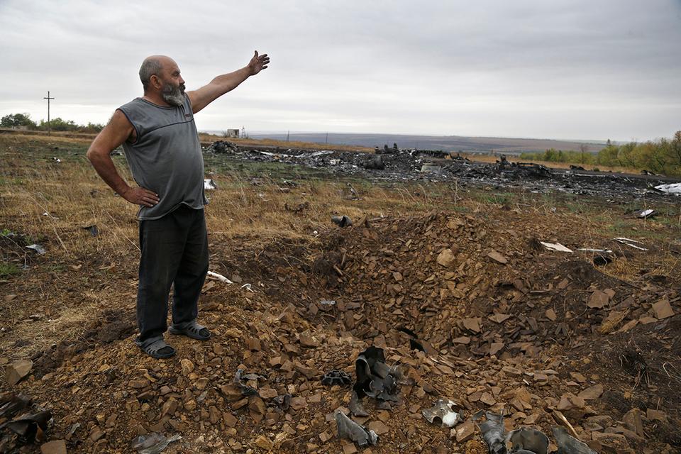 12 43627992 - 09_09_2014 - Ukraine mh17 - Sergei Grits