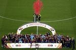 Fejring. FC Barcelona vandt pokalfinalen, men bliver nu straffet på grund af handlinger på lægterne. 