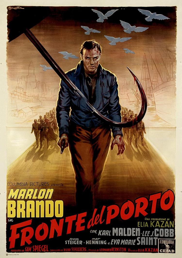 Plakat. Blod i hovedet og på krogen. At dømme ud fra plakaten, kunne ' I storbyens havn' ligesåvel være en gyser- eller zombiefilm. Plakat fra filmen. 