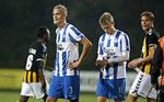 Skifte. Kasper Larsen fra OB (nummer to fra venstre) skifter til hollandsk fodbold. 