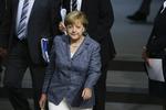 Ordknap. Den tyske kansler Angela Merkel ankommer til debatten og afstemningen i det tyske parlament om endnu en hjælpepakke til den græske økonomi. 