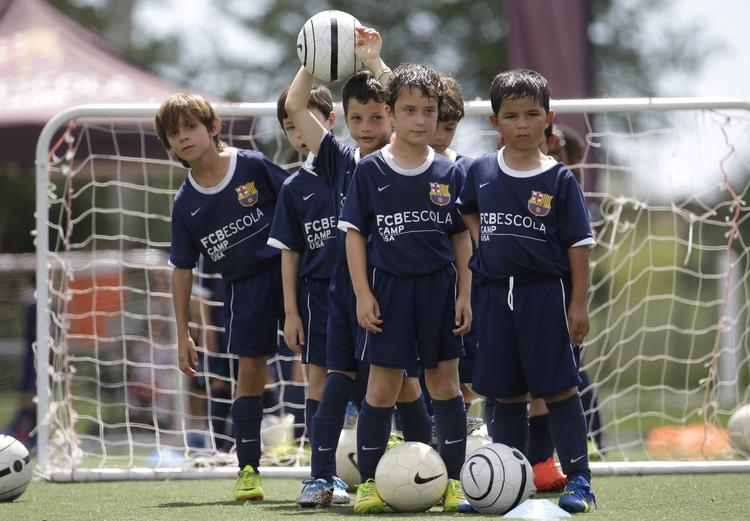 Talentjagt. Barcelona har akademier over hele kloden. Her er amerikanske børn til træning i Miami, USA. 