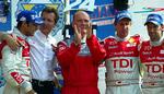 Dr. Wolfgang Ullrich (i rødt), der her fejrer en af Audis mange Le Mans-sejre, er sat i skammekrogen resten af DTM-sæsonen. 