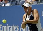 knusende. Caroline Wozniacki var i godt spillehumør i kampen ved første runde i US Open, hvor Jamie Loeb ikke blev levnet mange chancer. 