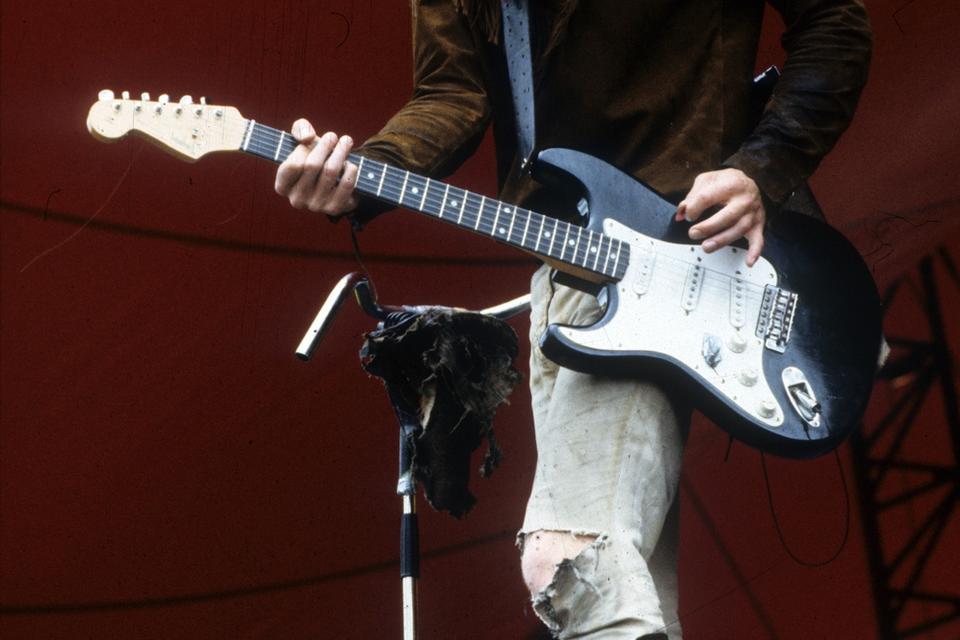 orange. Jesper Binzer i front for Disneyland After Dark på Roskilde Festival 1986. Det var på Orange Scene. 