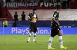 2-0. Skuffede Gladbach-spillere reagerer under kampen mod Sevilla. 