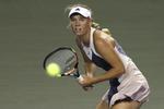 KVARTFINALIST. Afhængig af indsatsen i Tokyo kan Caroline Wozniacki i næste uge ligge alt fra nummer 6 til 13 på verdensranglisten. 