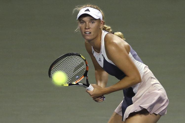KVARTFINALIST. Afhængig af indsatsen i Tokyo kan Caroline Wozniacki i næste uge ligge alt fra nummer 6 til 13 på verdensranglisten. 