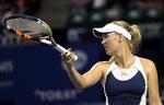 Sejr. Caroline Wozniacki havde i dele af kampen mod Angelique Kerber problemer, men vandt i sidste ende. 