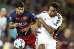 2-1. Barcelonas Luis Suarez var passiv passager i kampen mod Leverkusen, indtil han blev suppleret med et suverænt oplæg af indskiftede Munir El Haddadi, som var et lyspunkt på et rådvildt Barcelona-hold. 