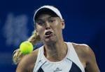 Videre. Wozniacki skal som minimum frem til semifinalen i Beijing, hvis hun skal kvalificere sig til WTA-sæsonfinalen senere i denne måned. 