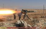 Krig. Militser fra Islamisk Stat affyrer et anti-tank missil i det nordøstlige Syrien i dette foto fra juni i år. Borgerkrigen har forvandlet landet til en broget slagmark, hvor flere grupper kæmper mod hinanden. 