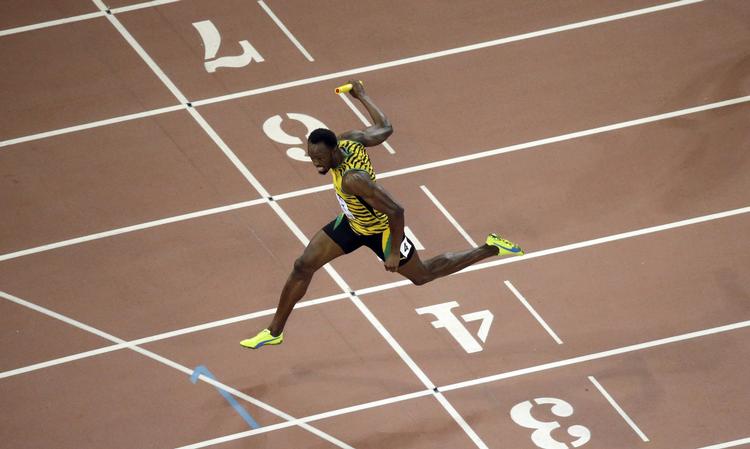 VERDENSMESTER. Da Usain Bolt løb over stregen og sikrede Jamaica VM-guldet i 4x100 meter, var det hans 11. verdensmesterskab. 
