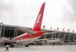 Vrede. Kinesiske stewardesser vil gøre op med et udbredt ritual i branchen. Her ses et fly fra det kinesiske flyselskab Shanghai Airline. 