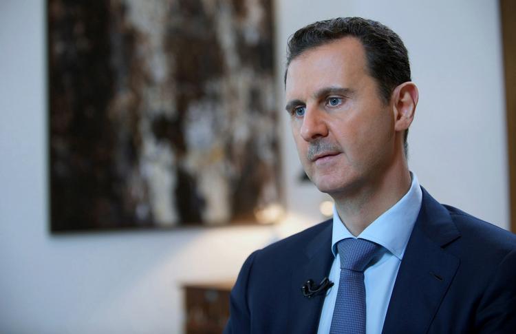 Leder. Syriens præsident Bashar al-Assad er under hårdt pres. I sit eget land af oprørsgrupper, der vinder terræn. Og internationalt, hvor stormagter kræver hans afgang. Rusland er dog en fast støtte. (arkivfoto) 