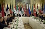 Samlet. USA, Rusland, Iran og 14 andre lande opfordrede i dag efter et møde i Østrigs hovedstad, Wien, til en landsomfattende våbenhvile i Syrien. 