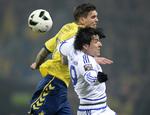 Hårdhed. Brøndbys Daniel Agger (tv) fik en albue i hovedet i en nærkamp af den senere udviste FCK'er Federico Santander. 